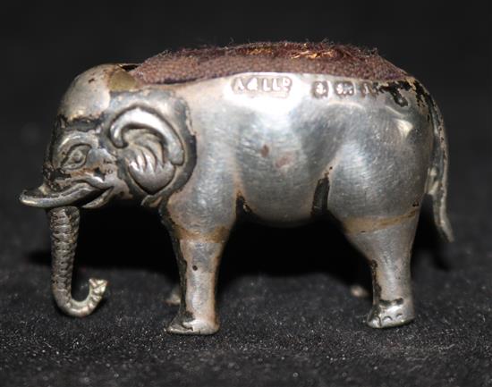 An Edwardian novelty silver pin cushion modelled as an elephant by Adie & Lovekin Ltd, Birmingham, 1908, approx. 1.75in.